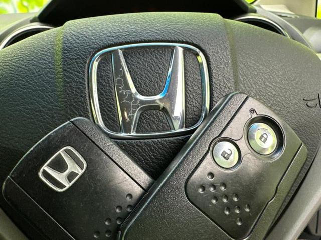 フィット １３Ｇ・１０ｔｈアニバーサリー　新品タイヤ／保証書／ＥＴＣ／ＥＢＤ付ＡＢＳ／エアバッグ　運転席／エアバッグ　助手席／パワーウインドウ／キーレススタート／パワーステアリング／オートライト／盗難防止システム／マニュアルエアコン（38枚目）