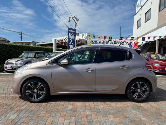 ２０８ シエロ　ユーザー様より買取　禁煙車　純正ナビ　テレビ　Ｗサンルーフ　ＥＴＣ　左右独立エアコン　クリアランスソナー（3枚目）