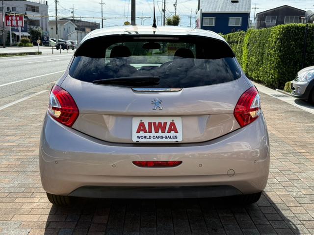 ２０８ シエロ　ユーザー様より買取　禁煙車　純正ナビ　テレビ　Ｗサンルーフ　ＥＴＣ　左右独立エアコン　クリアランスソナー（5枚目）