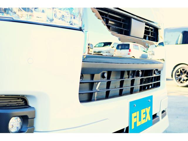 ハイエースバン スーパーGL ダークプライムII バットフェイスボンネット モデリスタフルエアロ リアバンパー FLEXオーバーフェンダー FLEXアルティメットVer2テール FLEXバルベロHEXホイール アルパインBIGX11インチナビ(35枚目)