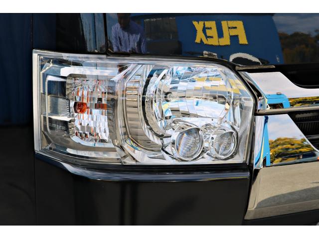 ハイエースバン スーパーGL ダークプライムII FLEXフロントスポイラー オバフェン W-DEEPSホイール アルティメットテール フリップアップベッド 1.5ローダウン 室内サイドバー パナ7インチナビ パイオニア天井スピーカー&フリップダウン(23枚目)