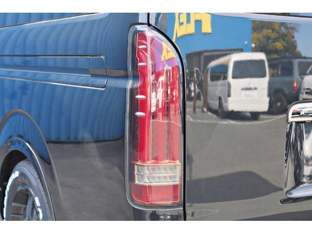 ハイエースバン スーパーGL ダークプライムII FLEXフロントスポイラー オバフェン W-DEEPSホイール アルティメットテール フリップアップベッド 1.5ローダウン 室内サイドバー パナ7インチナビ パイオニア天井スピーカー&フリップダウン(24枚目)