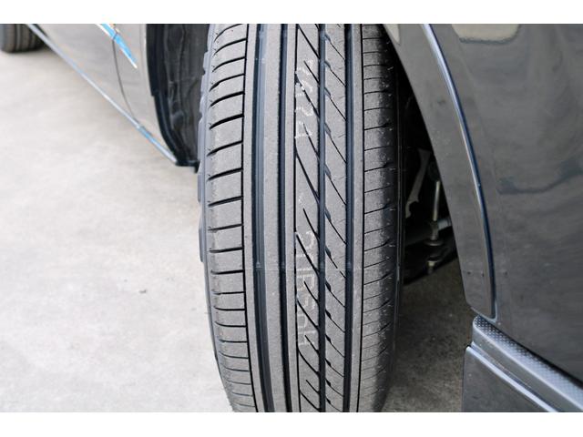 ハイエースバン スーパーGL ダークプライムII FLEXフロントスポイラー オバフェン W-DEEPSホイール アルティメットテール フリップアップベッド 1.5ローダウン 室内サイドバー パナ7インチナビ パイオニア天井スピーカー&フリップダウン(44枚目)