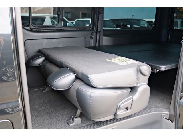 ハイエースバン スーパーGL ダークプライムII FLEXフロントスポイラー オバフェン W-DEEPSホイール アルティメットテール フリップアップベッド 1.5ローダウン 室内サイドバー パナ7インチナビ パイオニア天井スピーカー&フリップダウン(55枚目)