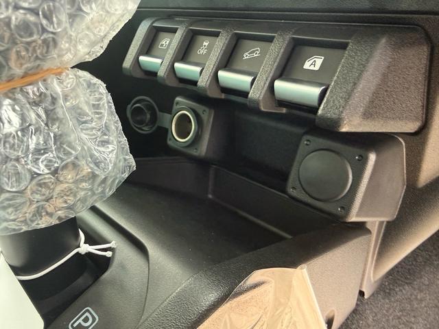 ジムニーノマド FC 未使用車 走行45キロ 4WD 禁煙車 衝突被害軽減システム レーダークルーズ コーナーセンサー スマートキー LEDヘッド 純正15インチアルミ 車線逸脱警報 オートライト オートエアコン(26枚目)