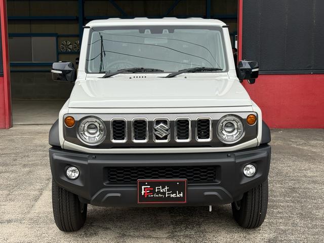 ジムニーノマド FC 未使用車 走行45キロ 4WD 禁煙車 衝突被害軽減システム レーダークルーズ コーナーセンサー スマートキー LEDヘッド 純正15インチアルミ 車線逸脱警報 オートライト オートエアコン(2枚目)