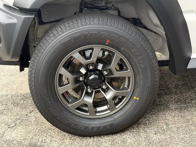 ジムニーノマド FC 未使用車 走行45キロ 4WD 禁煙車 衝突被害軽減システム レーダークルーズ コーナーセンサー スマートキー LEDヘッド 純正15インチアルミ 車線逸脱警報 オートライト オートエアコン(12枚目)