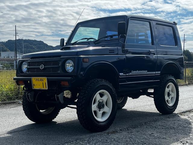 ジムニー ランドベンチャー ブルーM MT5速 シートカバー リフトアップGeolandar M/T 6.50R16 ブラッドレーホイール前後社外バンパー 新品天井ETC付きエアコン(3枚目)