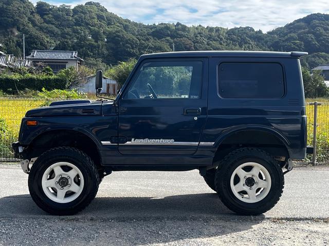ジムニー ランドベンチャー ブルーM MT5速 シートカバー リフトアップGeolandar M/T 6.50R16 ブラッドレーホイール前後社外バンパー 新品天井ETC付きエアコン(6枚目)