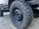 　リフトアップ　２２５／７５Ｒ１６タイヤ　前後社外バンパー　社外グリル　社外マフラー　モモステアリング　天井張替え　シートカバー　ターボ　４ＷＤ切替式　ＡＴ（44枚目）