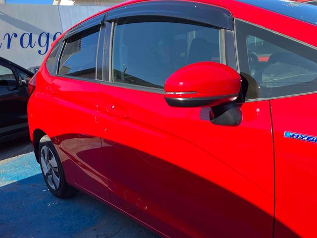 フィットハイブリッド Ｆパッケージ　ハイブリッド　ＥＴＣ　バックカメラ　ナビ　ＴＶ　スマートキー　電動格納ミラー　ＡＴ　盗難防止システム　衝突安全ボディ　ＣＤ　ＵＳＢ　ミュージックプレイヤー接続可　Ｂｌｕｅｔｏｏｔｈ　ＡＢＳ　ＥＳＣ（22枚目）