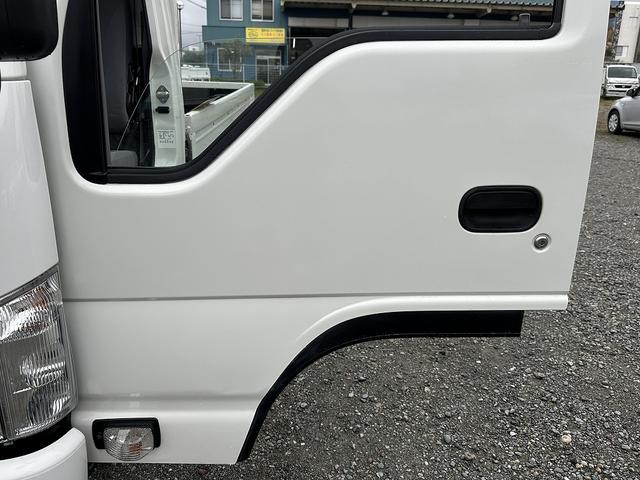 タイタントラック 　ＥＴＣ／ＡＳＲ／左電動格納ミラー／パイオニア製社外ナビ／Ｂｌｕｅｔｏｏｔｈ　Ａｕｄｉｏ／アイドリングストップ／フォグランプ付／リアダブルタイヤ／ミックスタイヤ装備（34枚目）