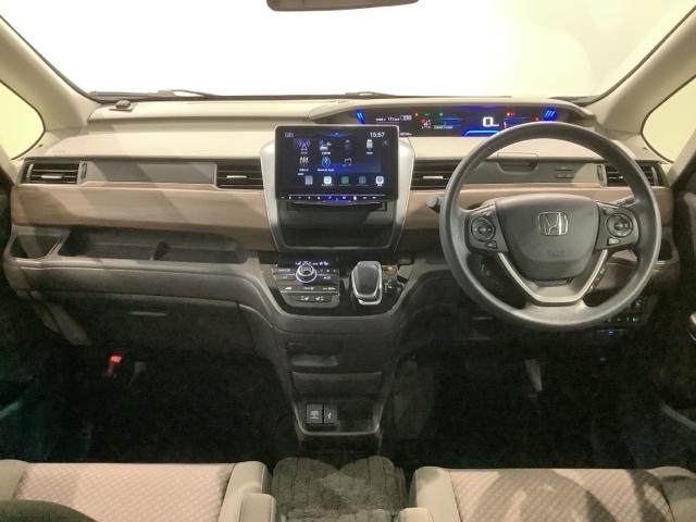 フリードハイブリッド ハイブリッド・Ｇ　Ｈ　ＳＥＮＳＩＮＧ　最長５年保証　ワンオーナー　Ｒカメラ　ＢＴオ－ディオ　ＥＴＣ　ＬＥＤライト　両側電動ドアＶＳＡ　シ－トヒ－タ－　クルコン　スマ－トキ－　スペアキ－　盗難防止装置　整備記録簿　ＡＡＣ（8枚目）