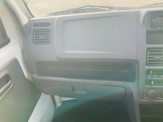 キャリイトラック 　軽トラック　３０，０００キロ！　ミッション　エアコン　運転席エアバッグ　助手席エアバッグ　５速ＭＴ　三方開　整備／点検記録簿あり　禁煙車　車検整備付き　修復歴なし　室内掃除済み　パワステ（47枚目）