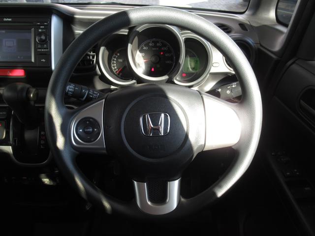 N-BOX GSSパッケージ 禁煙車・ワンオーナー 両側スライド片側電動ドア ダブルエアバック 点検記録簿 イモビ 1オーナー車 1セグTV 前席シートヒーター スマートキー&プッシュスタート ベンチシ-ト ETC付き 横滑防止(12枚目)