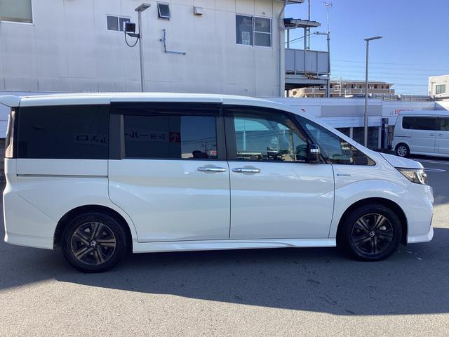 ステップワゴンスパーダ スパーダハイブリッドG・EXホンダセンシングブラスタ ナビETCバックカメラ禁煙車ワンオーナー リアカメラ AC アラウンドビューモニター 1オーナー CMBS LEDライト ABS 左右電動スライドドア DVD サイドエアバッグ スマキー フルセグ(6枚目)