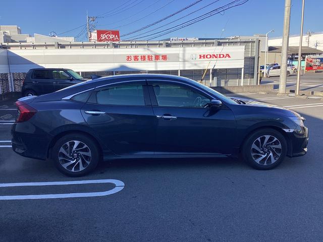 シビック セダン　１年保証距離無制限ＥＴＣワンオーナー禁煙車　サイドエアバッグ　ワンオーナー車　横滑り防止装置　リアカメラ　クルーズコントロール　スマキー　前席シートヒーター　フルオートエアコン　ＡＢＳ　ターボ車（6枚目）