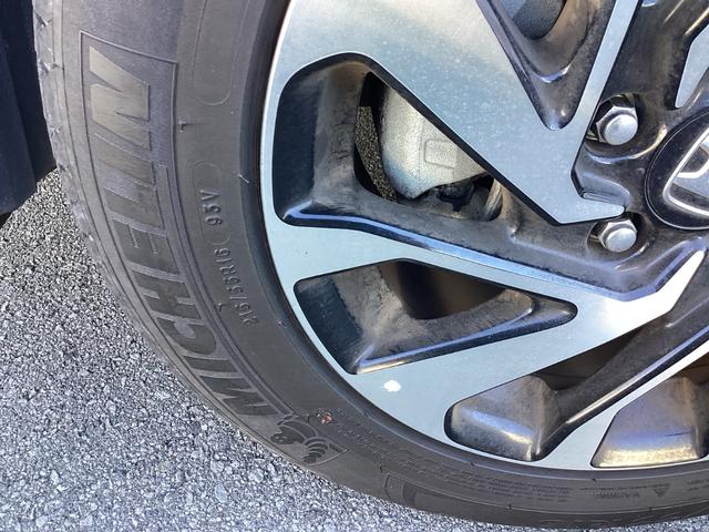 シビック セダン　１年保証距離無制限ＥＴＣワンオーナー禁煙車　サイドエアバッグ　ワンオーナー車　横滑り防止装置　リアカメラ　クルーズコントロール　スマキー　前席シートヒーター　フルオートエアコン　ＡＢＳ　ターボ車（33枚目）