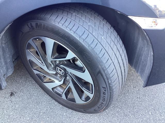 シビック セダン　１年保証距離無制限ＥＴＣワンオーナー禁煙車　サイドエアバッグ　ワンオーナー車　横滑り防止装置　リアカメラ　クルーズコントロール　スマキー　前席シートヒーター　フルオートエアコン　ＡＢＳ　ターボ車（34枚目）