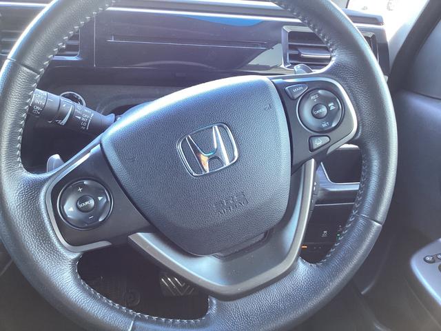 ステップワゴンスパーダ スパーダ・クールスピリットホンダセンシング ナビETCバックカメラ禁煙車ワンオーナー サイドエアバック スマートキ 左右電動スライドドア バックモニタ 地TV ナビ&TV 助手席エアバッグ AAC 横滑り防止機能 ターボ車 シートヒータ ABS(9枚目)