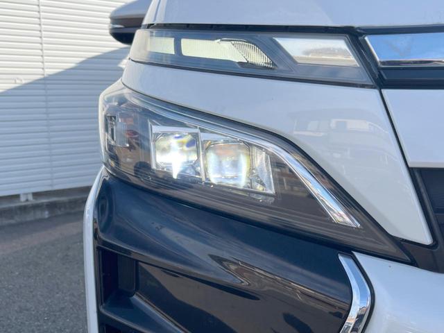 ヴォクシー ＺＳ　禁煙　７人乗り　両側電動スライド　衝突軽減　ＢＩＧ－Ｘ９型ナビ　後席モニター　バックカメラ　ＥＴＣ　クルコン　オートハイビーム　オートライト　デュアルエアコン　純正アルミ　Ｂｌｕｅｔｏｏｔｈ（14枚目）