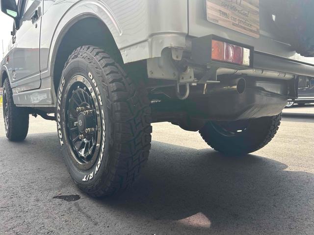 ジムニー 　禁煙車　茶色シートカバー　社外１６インチＡＷ　４ＷＤ　ＥＴＣ　ＡＴ　ＣＤ　アルミホイール　エアコン（25枚目）
