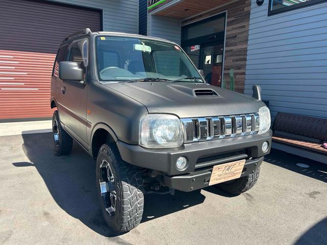 ジムニー ワイルドウインド　４ＷＤ　ルーフレール　レイズ１６インチホイール　マットブラック塗装　社外ＴＯＴＳＵＧＥＫＩマフラー　社外ＲＯＡＤＷＩＮラテラルロッド　シートヒーター　社外ナビ　ＥＴＣ　スペアキー（2枚目）