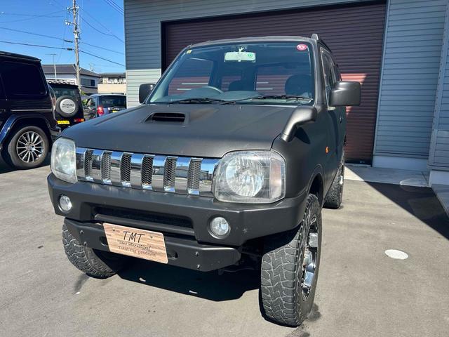 ジムニー ワイルドウインド　４ＷＤ　ルーフレール　レイズ１６インチホイール　マットブラック塗装　社外ＴＯＴＳＵＧＥＫＩマフラー　社外ＲＯＡＤＷＩＮラテラルロッド　シートヒーター　社外ナビ　ＥＴＣ　スペアキー（3枚目）