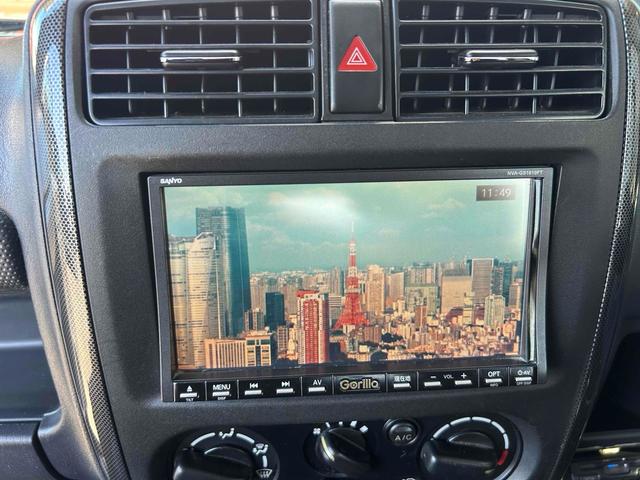 ジムニー ワイルドウインド　４ＷＤ　ルーフレール　レイズ１６インチホイール　マットブラック塗装　社外ＴＯＴＳＵＧＥＫＩマフラー　社外ＲＯＡＤＷＩＮラテラルロッド　シートヒーター　社外ナビ　ＥＴＣ　スペアキー（22枚目）