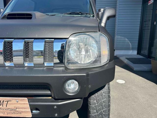 ジムニー ワイルドウインド　４ＷＤ　ルーフレール　レイズ１６インチホイール　マットブラック塗装　社外ＴＯＴＳＵＧＥＫＩマフラー　社外ＲＯＡＤＷＩＮラテラルロッド　シートヒーター　社外ナビ　ＥＴＣ　スペアキー（29枚目）