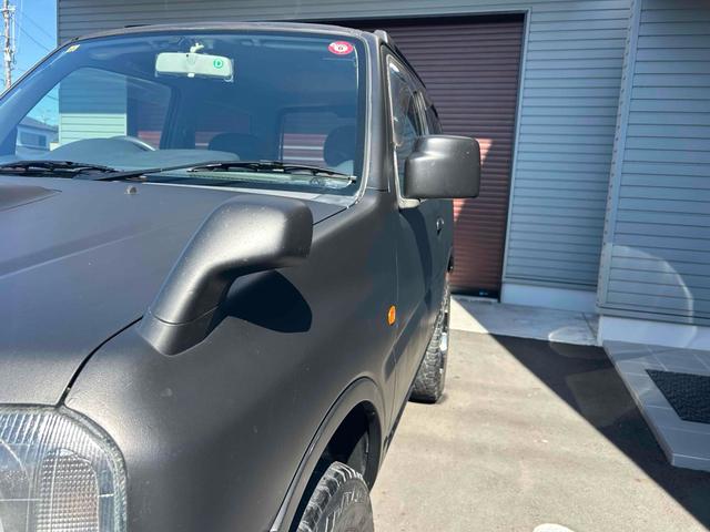 ジムニー ワイルドウインド　４ＷＤ　ルーフレール　レイズ１６インチホイール　マットブラック塗装　社外ＴＯＴＳＵＧＥＫＩマフラー　社外ＲＯＡＤＷＩＮラテラルロッド　シートヒーター　社外ナビ　ＥＴＣ　スペアキー（41枚目）