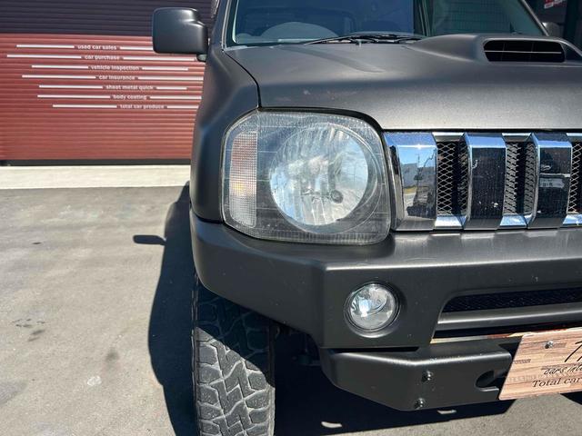 ジムニー ワイルドウインド　４ＷＤ　ルーフレール　レイズ１６インチホイール　マットブラック塗装　社外ＴＯＴＳＵＧＥＫＩマフラー　社外ＲＯＡＤＷＩＮラテラルロッド　シートヒーター　社外ナビ　ＥＴＣ　スペアキー（42枚目）