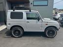 　禁煙車　茶色シートカバー　社外１６インチＡＷ　４ＷＤ　ＥＴＣ　ＡＴ　ＣＤ　アルミホイール　エアコン（22枚目）