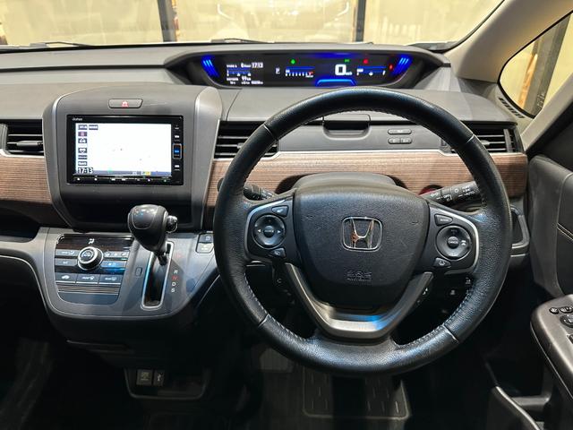 フリード クロスター・ホンダセンシング　１年保証／純正ナビ／両側電スラ／前後ＤＲ　両ＰＳＤ　ＵＳＢポート　地デジ　エアバック　Ｉストップ　ＶＳＡ　リヤカメラ　３列シート　ＤＶＤ再生　ウォークスルー　ワンオーナー　キーフリー　パワステ　ＡＡＣ（26枚目）