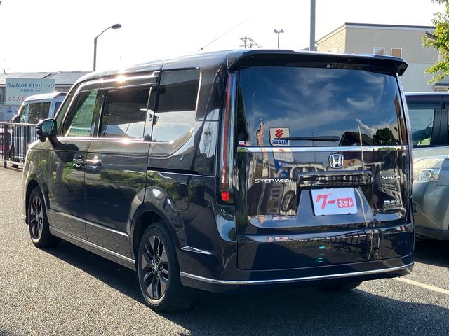 ステップワゴン ｅ：ＨＥＶスパーダ　ホンダセンシング　ワンオーナー　記録簿　ナビＴＶ　マルチビューカメラ　ＥＴＣ　パワーテールゲート　オットマン　ブラインドスポットインフォメーション　コンビシート　シートヒーター（5枚目）