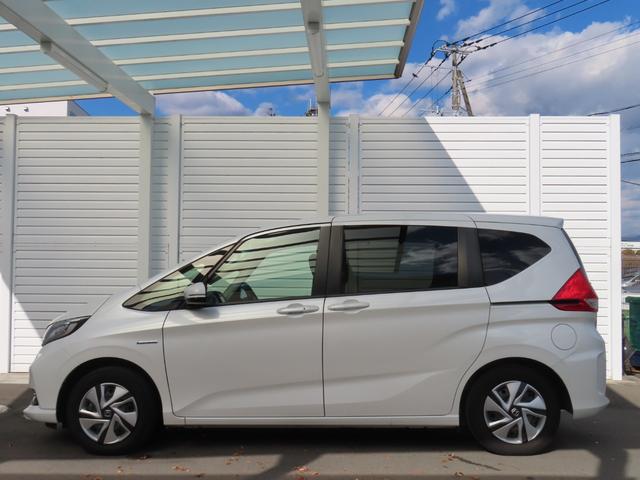 フリードハイブリッド ハイブリッド・Gホンダセンシング ナビフルセグドラレコRカメラETCLED 軽減ブレーキ キーフリーシステム 1オ-ナ- DVD再生可能 サイドカーテンエアバック ECON 禁煙 後カメラ Aクルーズ 地デジフルセグTV シートH(4枚目)