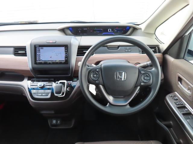 フリードハイブリッド ハイブリッド・Gホンダセンシング ナビフルセグドラレコRカメラETCLED 軽減ブレーキ キーフリーシステム 1オ-ナ- DVD再生可能 サイドカーテンエアバック ECON 禁煙 後カメラ Aクルーズ 地デジフルセグTV シートH(12枚目)