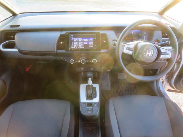 フィット ｅ：ＨＥＶベーシック　ワンオーナー／前後ドラレコ／ホンダセンシング／純正ＳＤナビ／Ｂｌｕｅｔｏｏｔｈ／ＥＴＣ／レーダークルーズ／ステアリングスイッチ／ソナー／スマートキー／プッシュスタート／ＬＥＤヘッドライト／バックカメラ（10枚目）