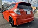 フィットハイブリッド ＲＳ　ファインスタイル　６速マニュアル　９インチナビ　ＥＴＣ　テイン車高調　ワークエモーション１７インチアルミ　社外マフラー（4枚目）