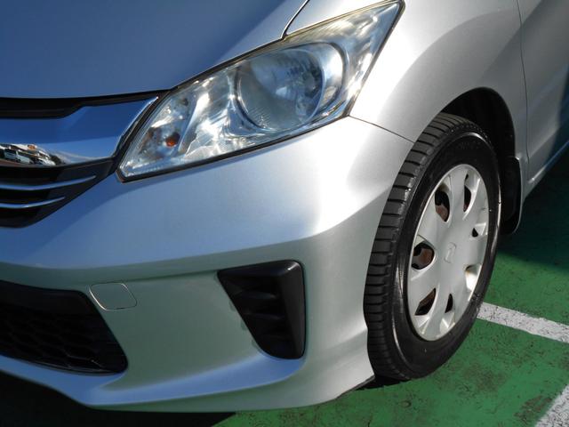 フリード Ｇ　ジャストセレクション　初度平成２７年４月　車検整備付き　走行８１９５９ＫＭ　３列シート７人乗り　２列目ベンチシート　両側スライドドア片側電動スライドドア　純正ナビ＋リヤカメラ＋ＥＴＣ＋フルセグ（6枚目）