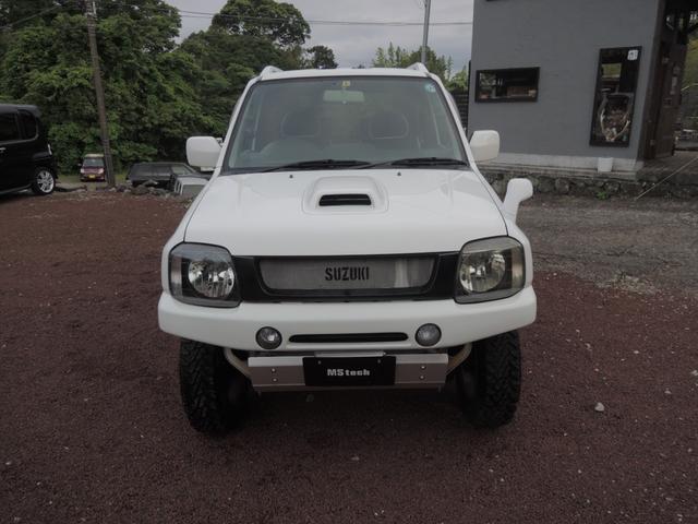 ジムニー XC リフトアップ&16AW&ジオランダーMT・F&Rショートバンパー・社外マフラー・HDDナビ&地デジフルセグTV・ETC・デフィブースト計・MOMOステアリング・シートカバー・ブローオフバルブ(3枚目)