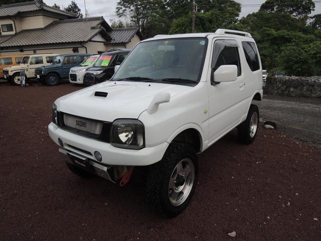 ジムニー XC リフトアップ&16AW&ジオランダーMT・F&Rショートバンパー・社外マフラー・HDDナビ&地デジフルセグTV・ETC・デフィブースト計・MOMOステアリング・シートカバー・ブローオフバルブ(4枚目)