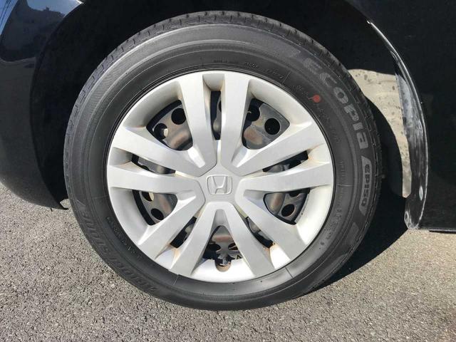 フィット ホーム　スマートキー　ブレーキサポート　レーダークルーズ　アイドリングストップ　横滑防止　オートライト　オートパーキング／ＨＯＬＤ　純正ナビＶＸＵ－２０５ＦＴｉ（9枚目）