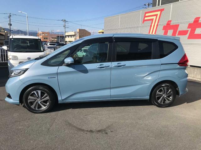 フリード+ハイブリッド ハイブリッドG・ホンダセンシング スマートキー ブレーキサポート 車線逸脱警報 レーダークルーズ アイドリングストップ 純正ナビ(CD/DVD/SD/BTオーディオ/フルセグ) バックカメラ ETC USB電源 オートライト(8枚目)