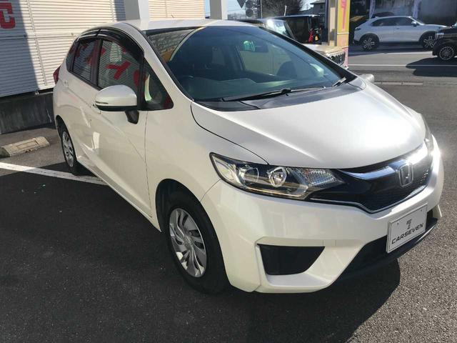 フィット １３Ｇ・Ｆパッケージ　スマートキー　アイドリングストップ　横滑防止　純正ナビＶＸＭ－１６４ＣＳｉ（ＣＤ／ＢＴオーディオ／ＡＭＦＭ／ワンセグ）　バックカメラ　ＥＴＣ　オートライト　オートミラー（3枚目）