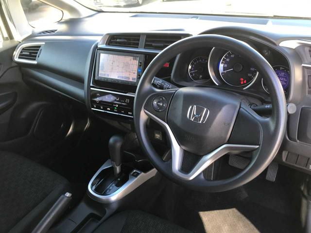 フィット １３Ｇ・Ｆパッケージ　スマートキー　アイドリングストップ　横滑防止　純正ナビＶＸＭ－１６４ＣＳｉ（ＣＤ／ＢＴオーディオ／ＡＭＦＭ／ワンセグ）　バックカメラ　ＥＴＣ　オートライト　オートミラー（13枚目）