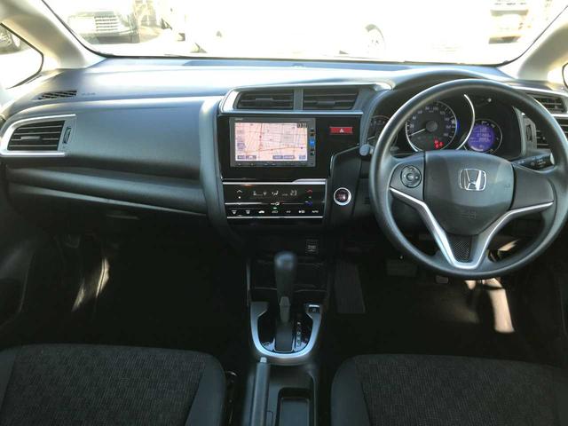 フィット １３Ｇ・Ｆパッケージ　スマートキー　アイドリングストップ　横滑防止　純正ナビＶＸＭ－１６４ＣＳｉ（ＣＤ／ＢＴオーディオ／ＡＭＦＭ／ワンセグ）　バックカメラ　ＥＴＣ　オートライト　オートミラー（18枚目）