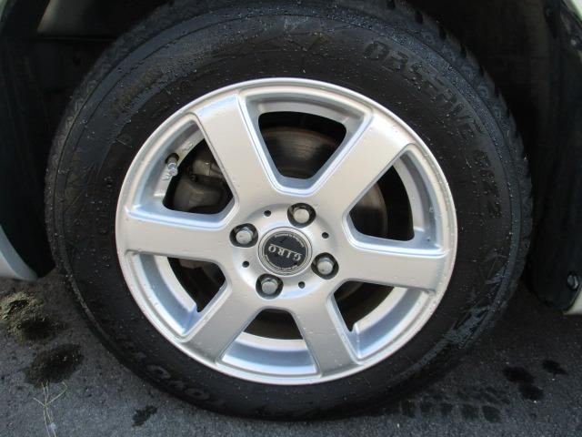 スイフト １．３ＸＧ　４ＷＤ　５速マニュアル　ナビ　ＣＤ／ＤＶＤ　オートエアコン　フロント左右シートヒーター　ワイパーデアイサー　ヒーテッドドアミラー　純正セキュリティ　スマートキー　キーフリー　１４インチＡＷ（8枚目）