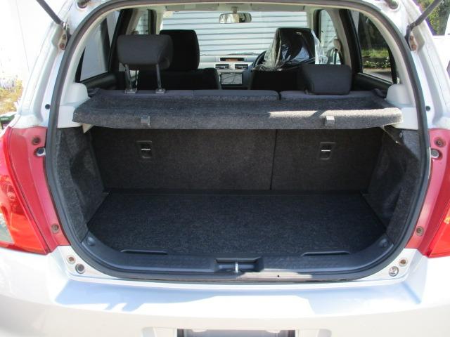 スイフト １．３ＸＧ　４ＷＤ　５速マニュアル　ナビ　ＣＤ／ＤＶＤ　オートエアコン　フロント左右シートヒーター　ワイパーデアイサー　ヒーテッドドアミラー　純正セキュリティ　スマートキー　キーフリー　１４インチＡＷ（13枚目）