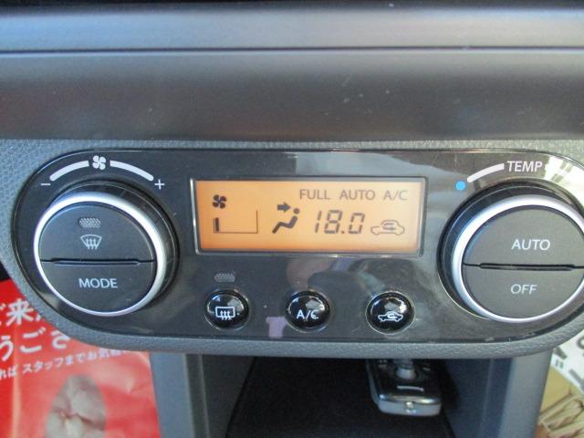 スイフト １．３ＸＧ　４ＷＤ　５速マニュアル　ナビ　ＣＤ／ＤＶＤ　オートエアコン　フロント左右シートヒーター　ワイパーデアイサー　ヒーテッドドアミラー　純正セキュリティ　スマートキー　キーフリー　１４インチＡＷ（14枚目）